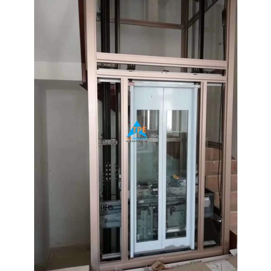 THANG MÁY QUAN SÁT LỒNG KÍNH